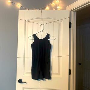 A Romper. From the brand All in Motion. It’s a size medium (7/8)